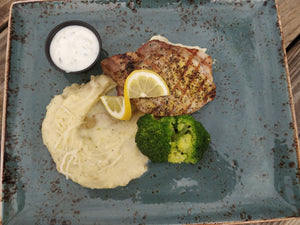 Grilled Pork Chop with cheese mashed potato, steamed broccoli and Tzatziki sauce